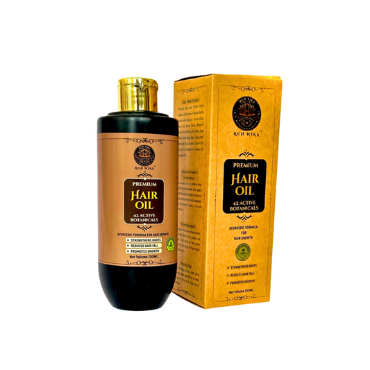 Ruh Nika premium herbal hair oil bottle with 42 active botanicals on white background  natural oil for hair growth, shine, and scalp nourishment.